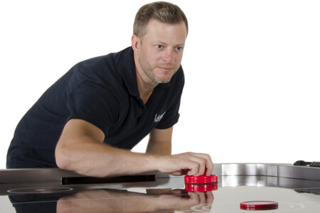 The Strikeworth Pro Ice air hockey table with pucks & pushers.