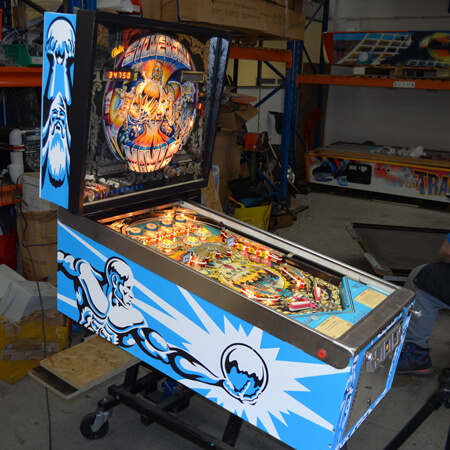 A vintage Silverball Mania pinball being restored.
