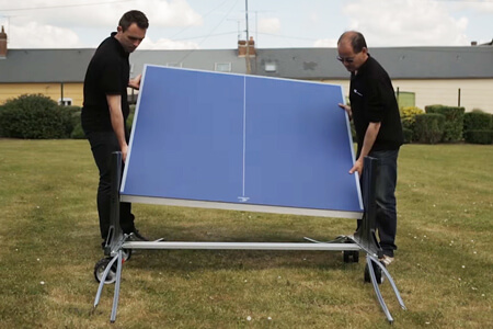 A tennis table being assembled.
