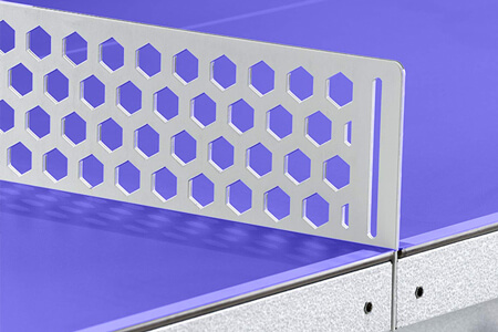 The metal net on an outdoor table tennis table.