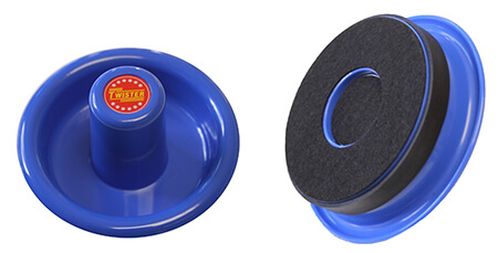 A set of Twister air hockey pushers.