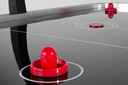 The playfield and rails on the Pro Ice air hockey.