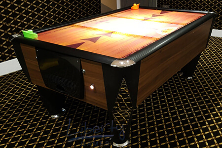 A SAM Superstrike commercial-standard home air hockey table.