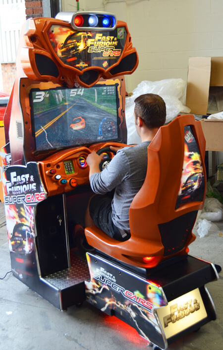 The Fast & Furious Super Cars arcade being play-tested.