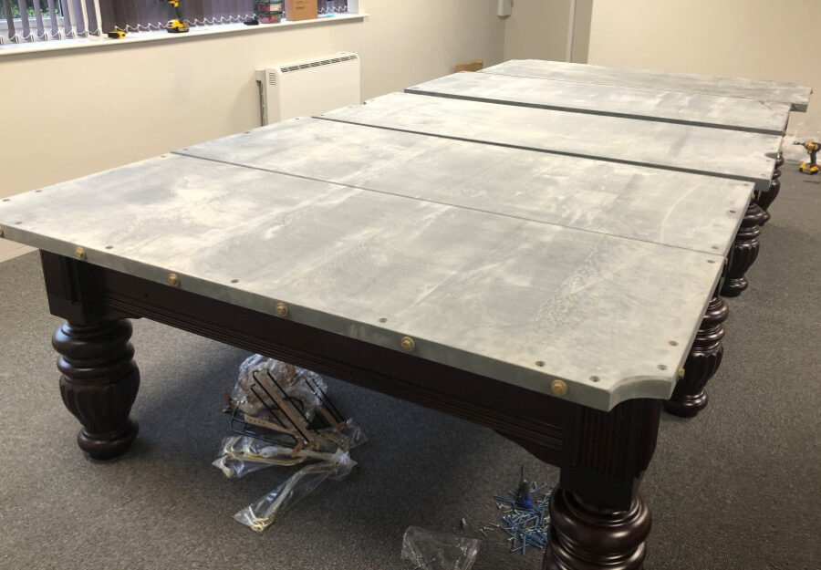 The slate and frame of a Dynamic Prince snooker table.