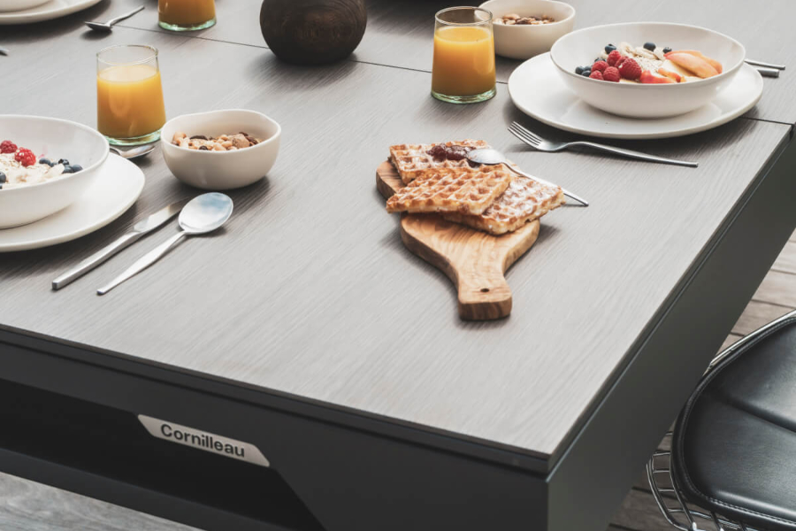 A pool table with dining top.