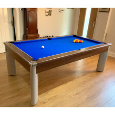 The Fusion pool dining table in Walnut.