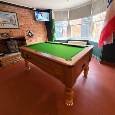 The Richmond Pool Table by Optima, In a Dark Walnut Finish with a Green Cloth Colour.