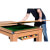 Lifting the tabletop onto the Classic Diner