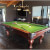 Napoleon Cherry Slate Bed Pool Table In A Room