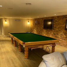 The Tagora Pool table in oak.