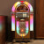Bubbler walnut front view in a room.