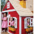Girls Playing In The Crooked Mansion Playhouse.