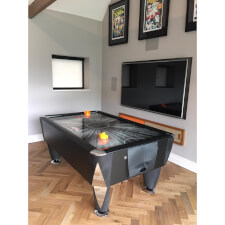 The Black Ice air hockey table.