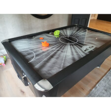 The Black Ice air hockey table.