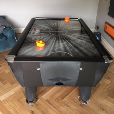 The Black Ice air hockey table.