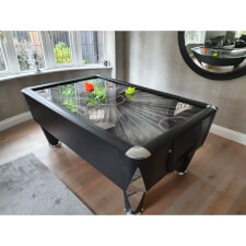The Black Ice air hockey table.