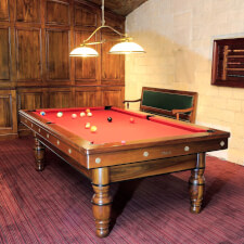 The Perigord luxury pool table, installed in a room.