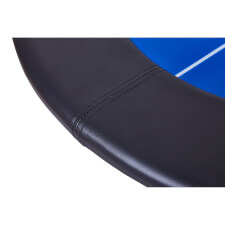 The cushioned arm rests on the Tekscore poker table.