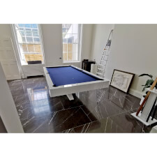 The Equilibrium Pool Table With A White Glossy Finish and Blue Cloth Installed By Liberty Games.