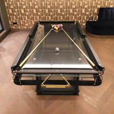 The G7 Mode Glass Pool Table in a room
