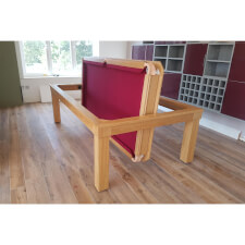 A VIP pool table in oak with burgundy cloth