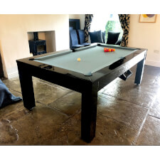 A Phoenix glossy black table with powder blue cloth