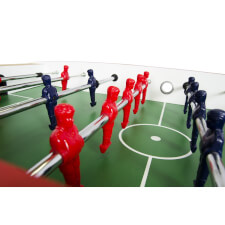 Players on the Free Kick football table