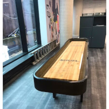 A Gentry shuffleboard table.