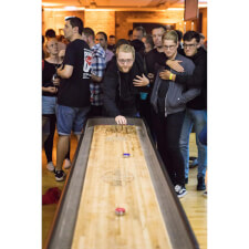 A game played on the Gentry shuffleboard table
