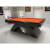 The Roma pool table with orange cloth.