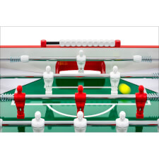 The pitch of a red Flamingo football table