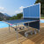 Butterfly Garden Rollaway 4000 Tennis Table half folded in blue.