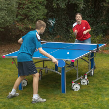 Kids playing Butterfly Garden Rollaway 5000 Tennis Table.