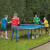Family playing Butterfly Garden Rollaway 5000 Tennis Table.
