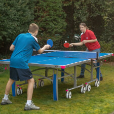 People playing in Butterfly Garden Rollaway 6000 Tennis Table.