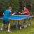 People playing in Butterfly Garden Rollaway 6000 Tennis Table.