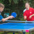 People playing Butterfly Garden Rollaway 7000 Tennis Table.