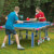 People playing Butterfly Garden Rollaway 7000 Tennis Table.