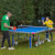People playing Butterfly Garden Rollaway 7000 Tennis Table.