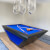 The Rameses table with royal blue cloth