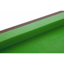 The cushion on the dark walnut snooker table.