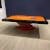 The Black Everest Slate Bed Pool table with orange cloth.