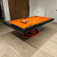 The Black Everest Slate Bed Pool table with orange cloth.