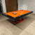 The Black Everest Slate Bed Pool table with orange cloth.