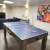 The 7ft Multi Games & Dining Table in Driftwood set for table tennis.