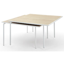 Spider tables stacked for storage.