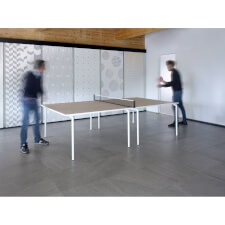 Playing a game on the Spider table tennis table.
