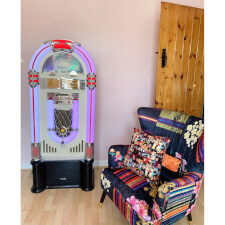 The 128V with optional jukebox stand.