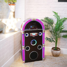 The Steepletone Jive Swing 90 Jukebox in a room.